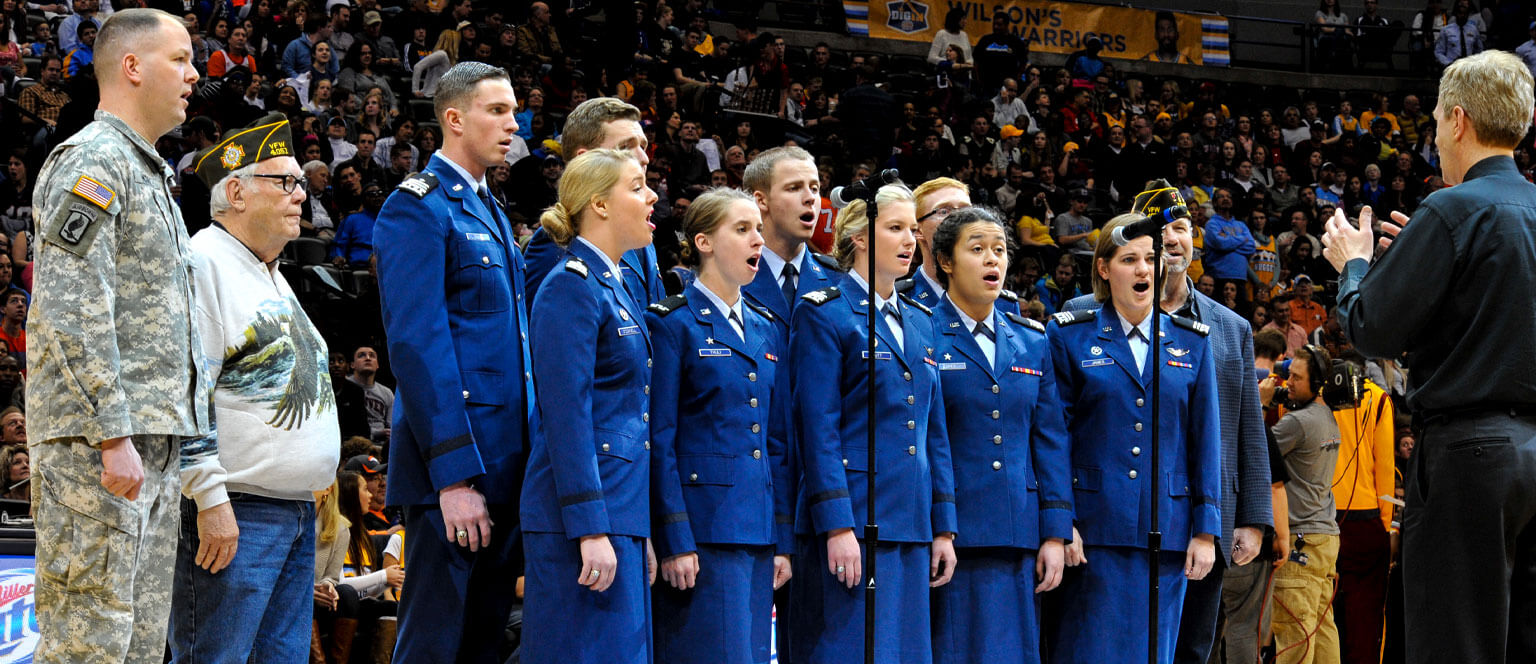 The Cadet Chorale performing for a crowd.