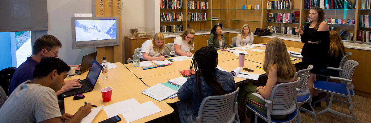 image of the Forensics Team during a group meeting.