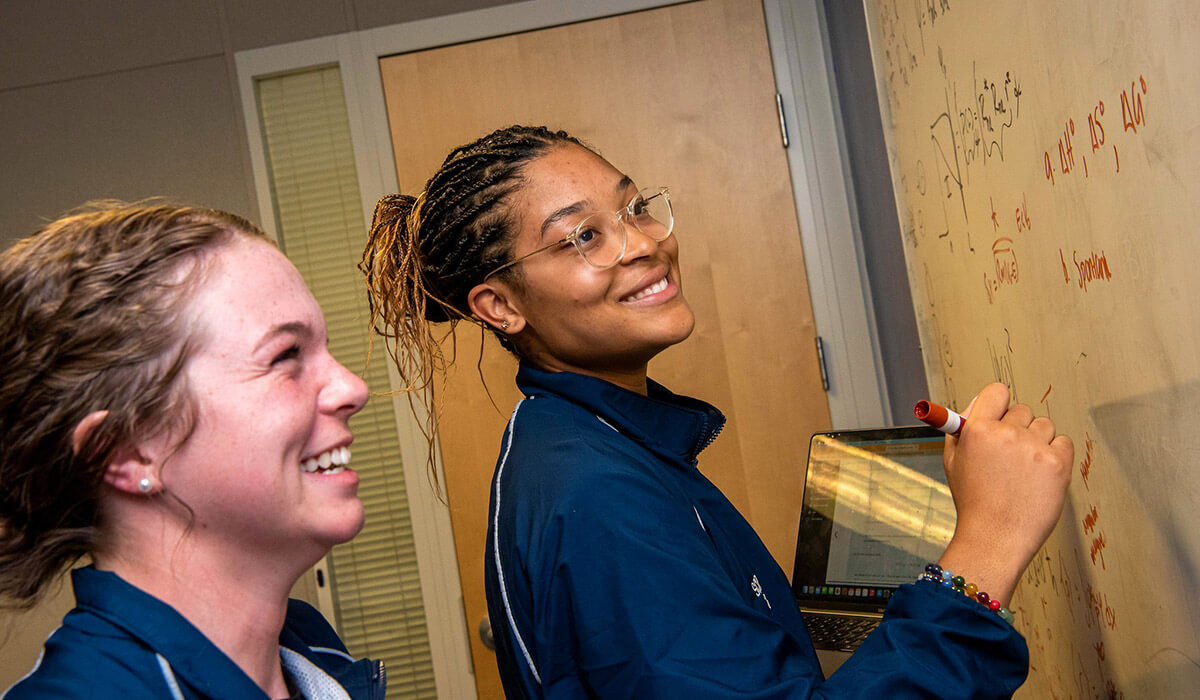 QRC - cadets working at white board