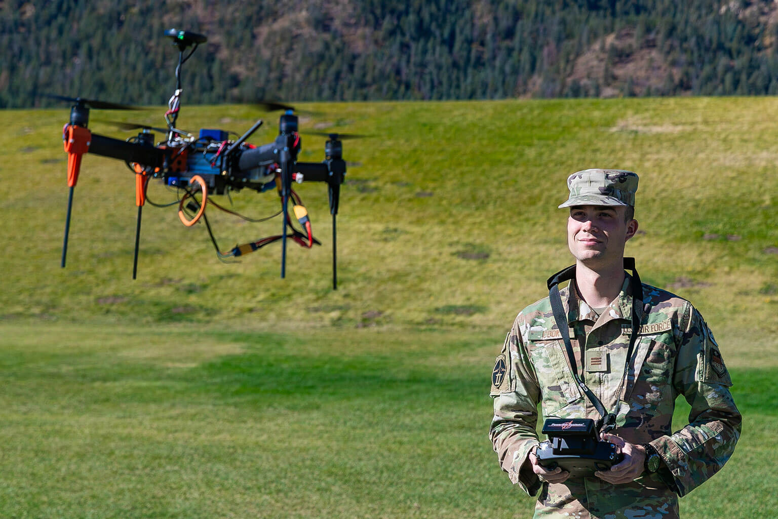 A cadet operating a drone at the U.S. Air Force Academy