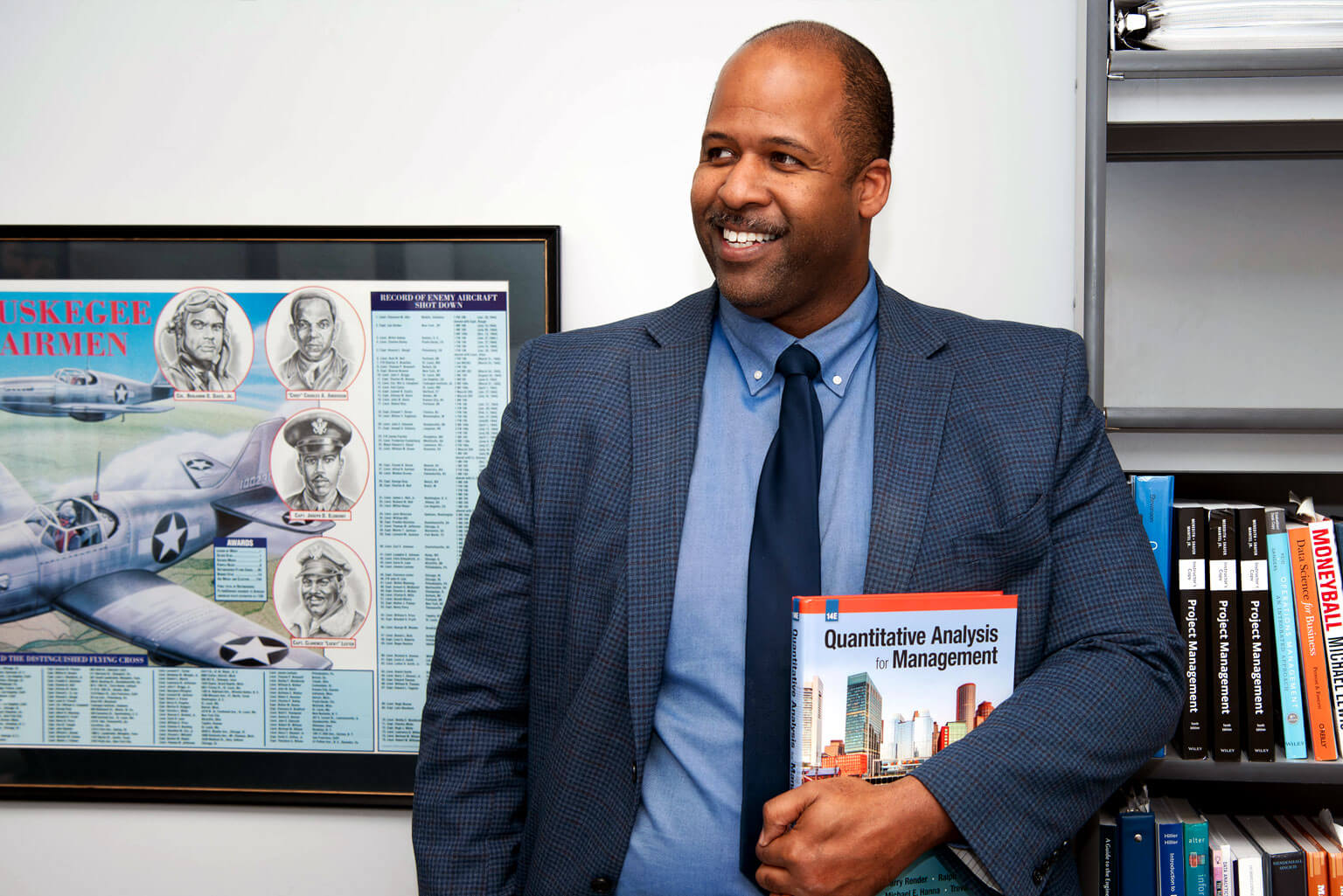 Dr. Eric Tucker poses in his office.