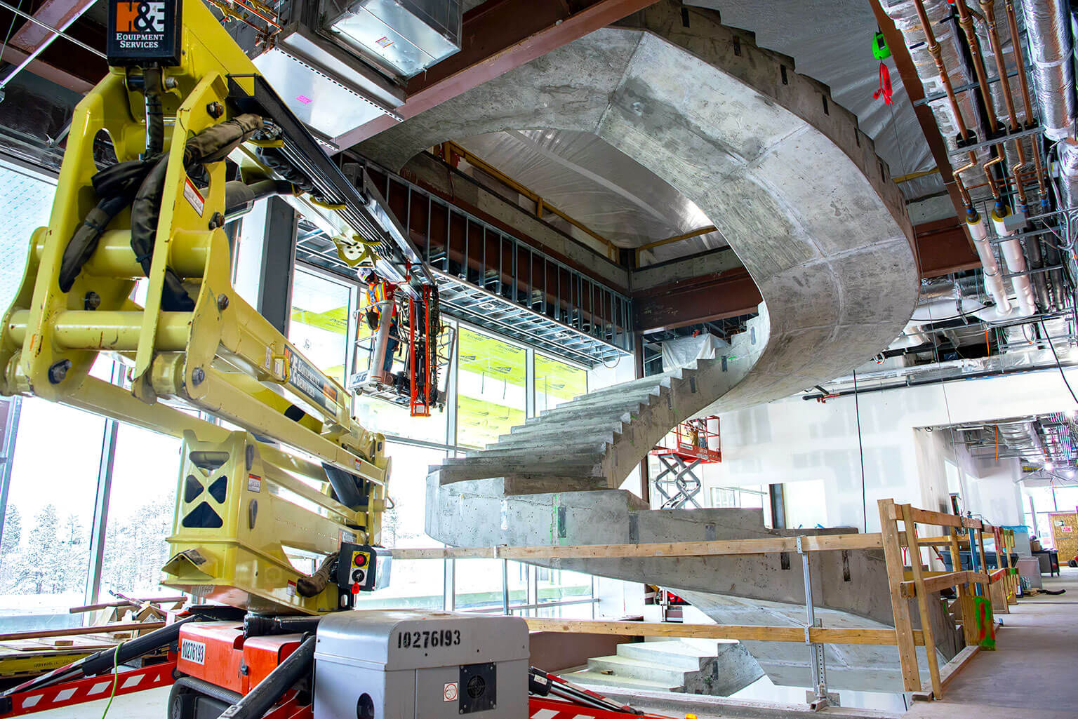 The staircase is a key feature in the Madera Cyber Innovation Center and reflects the staircase in the McDermott Library.