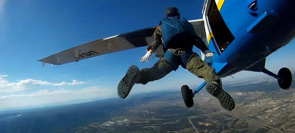 cadet skydiver jumps out of airplane