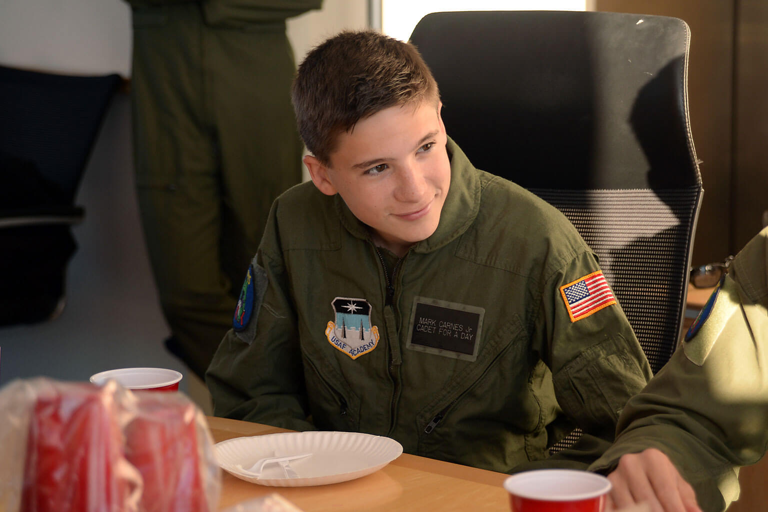 Mark Carnes, 15, eats breakfast with cadets and staff at the U.S. Air Force Academy, Nov. 10, 2016. Carnes became an Academy cadet for a day through the Cadet for a Day Program run by the Academy and the Make a Wish Foundation since 2000.