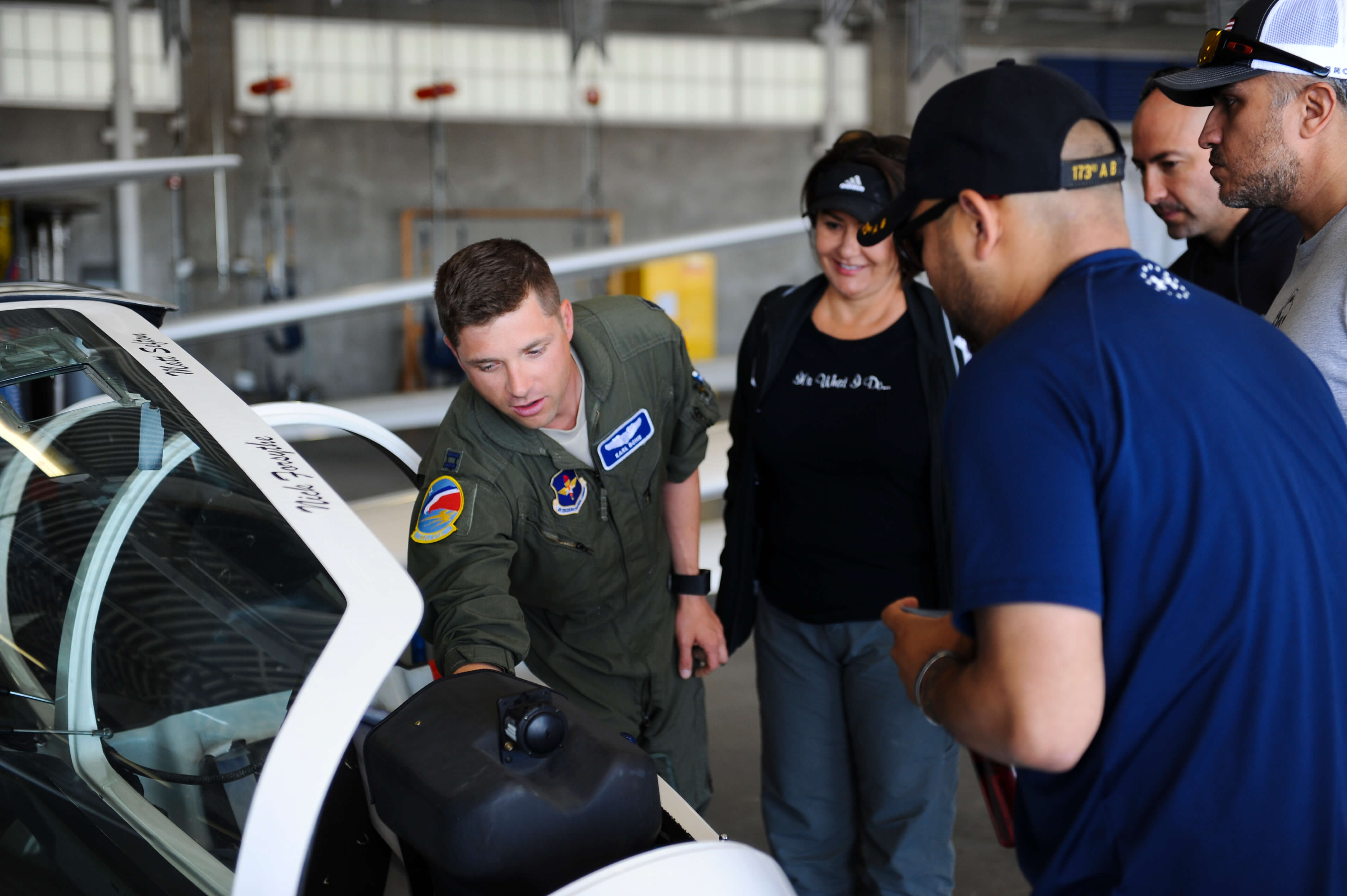 wounded warrior veterans examine a glider
