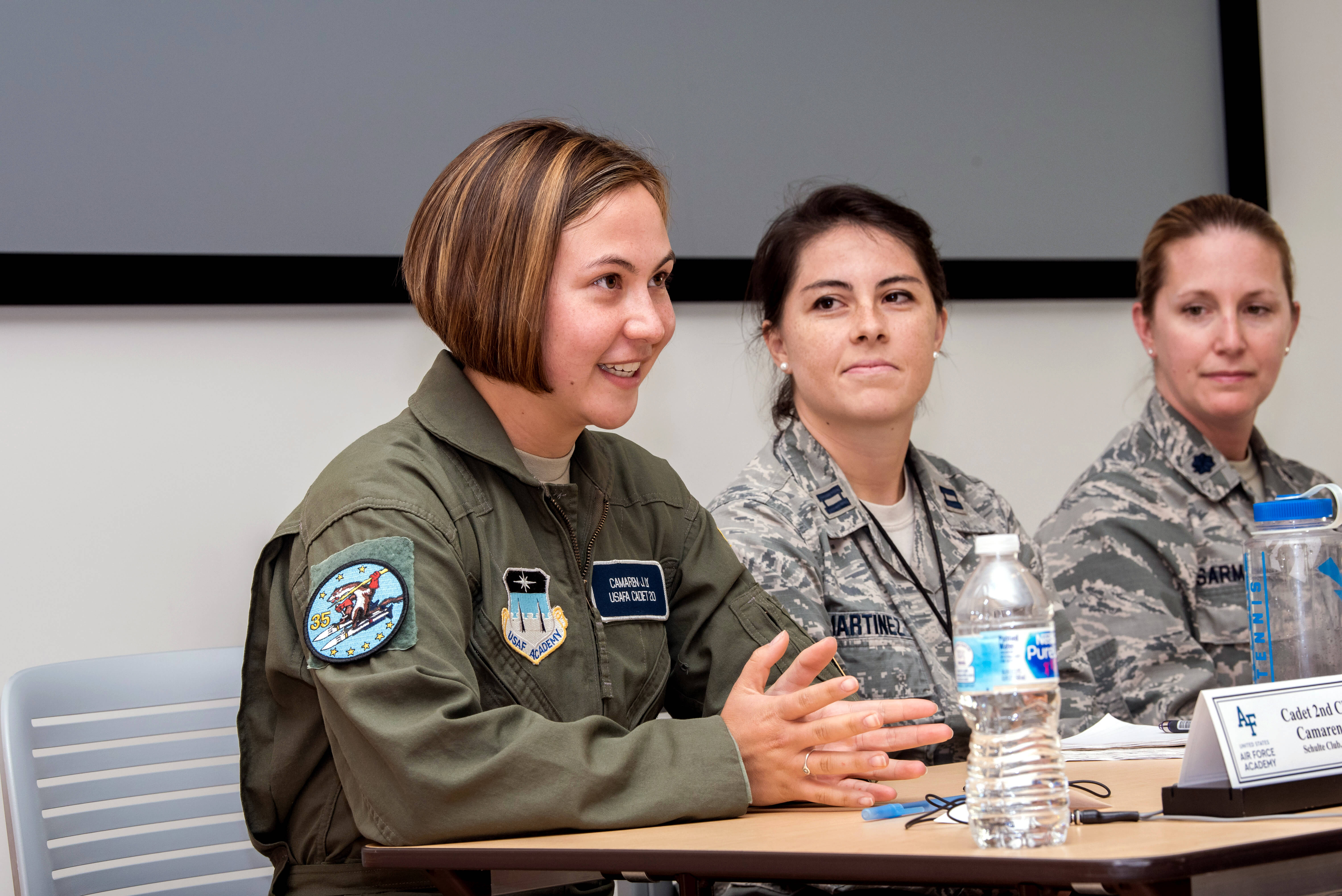 Cadet 2nd Class Camaren Ly talks to an audience of influential women visiting the U.S. Air Force Academy