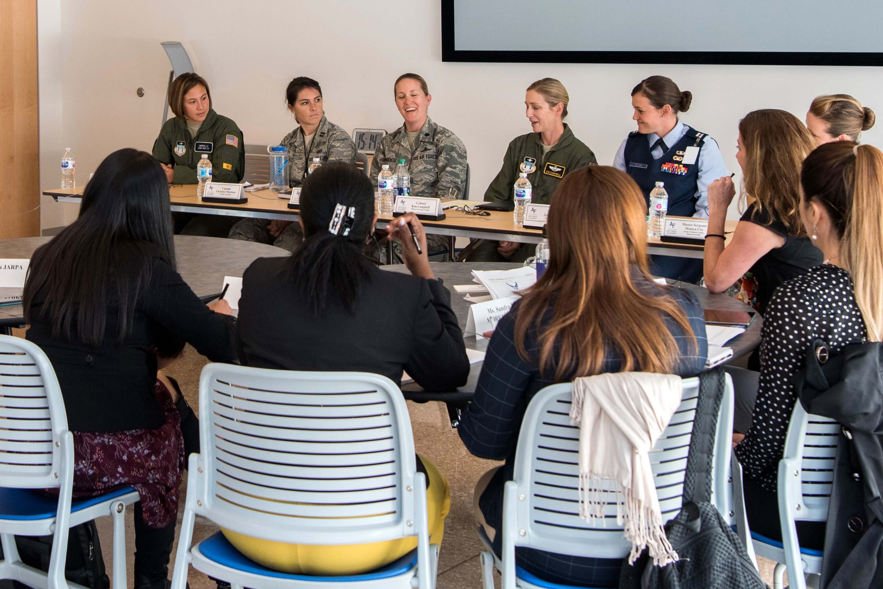 Women sit around a table as part of International Visitor-International Leader Program