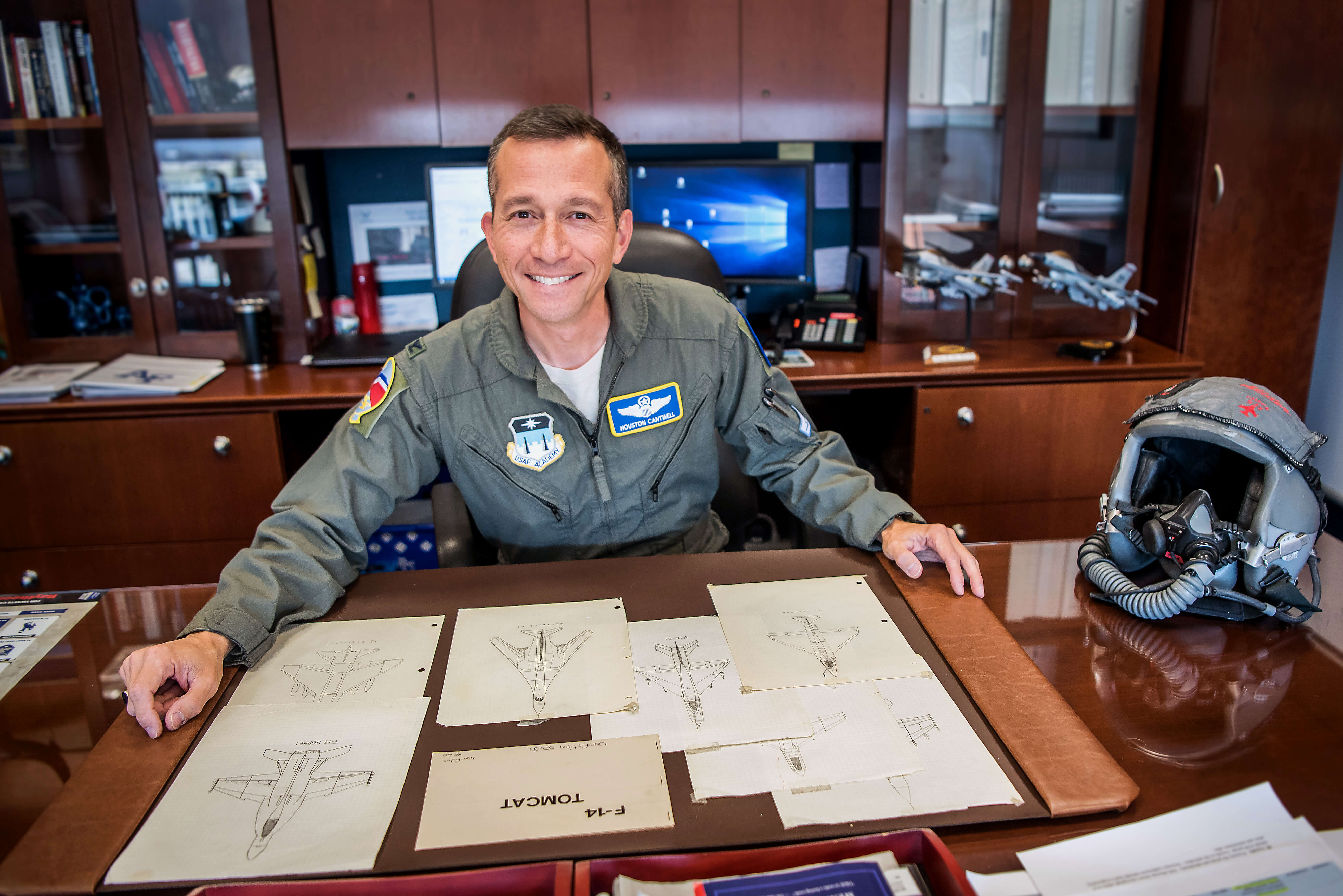 Col. Houston Cantwell, the vice superintendent of the U.S. Air Force Academy, is shown here in his Harmon Hall office, Nov. 9, 2018, with drawings he made of fighter aircraft during his elementary school years