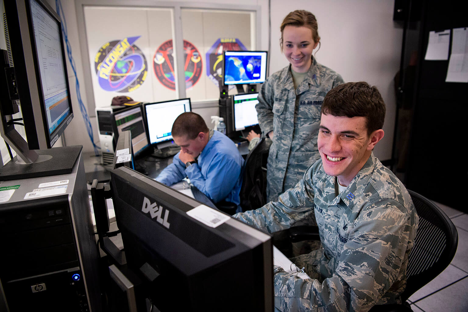 Cadets working with contact for the cadet-designed FalconSAT satellite