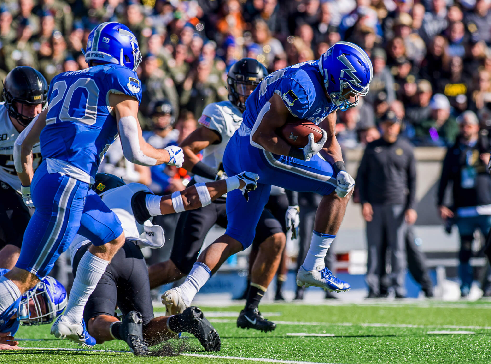 Air Force football players competing against Army