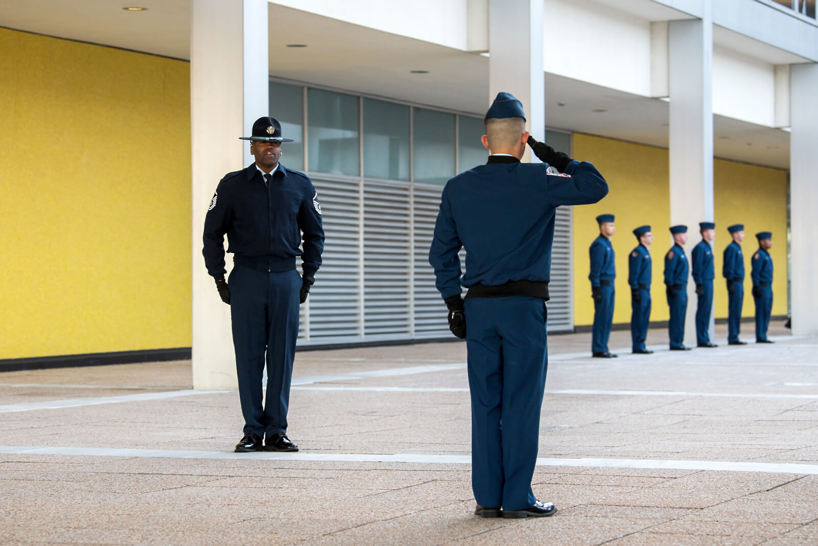 Cadets in front of building