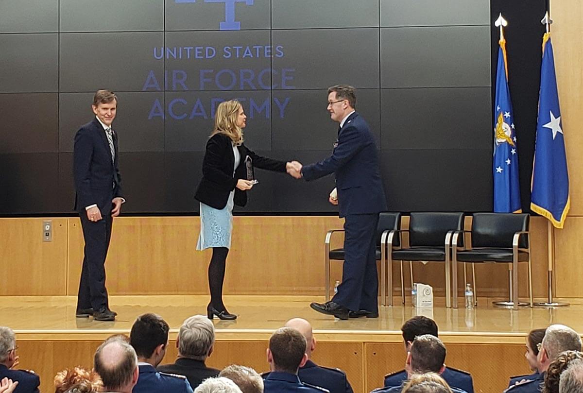 Dr. Martiqua Post receiving the Martinson SoTL Research Award January 2019