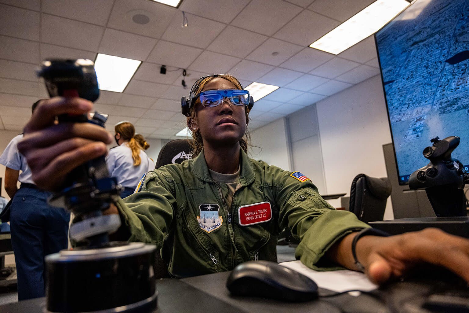 Cadet using controls in lab