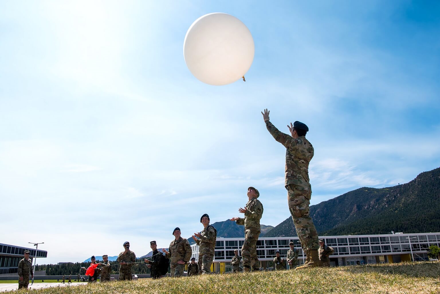 Group of cadets launching weather balloon