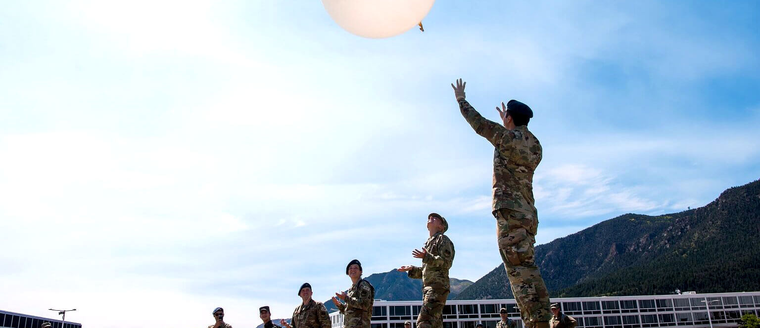 Group of cadets launching weather balloon