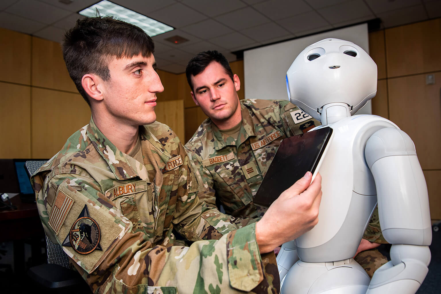 Cadets working with robot