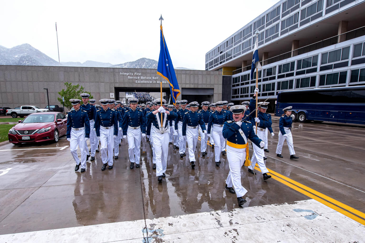 Class of 2022 on graduation day marching outside.