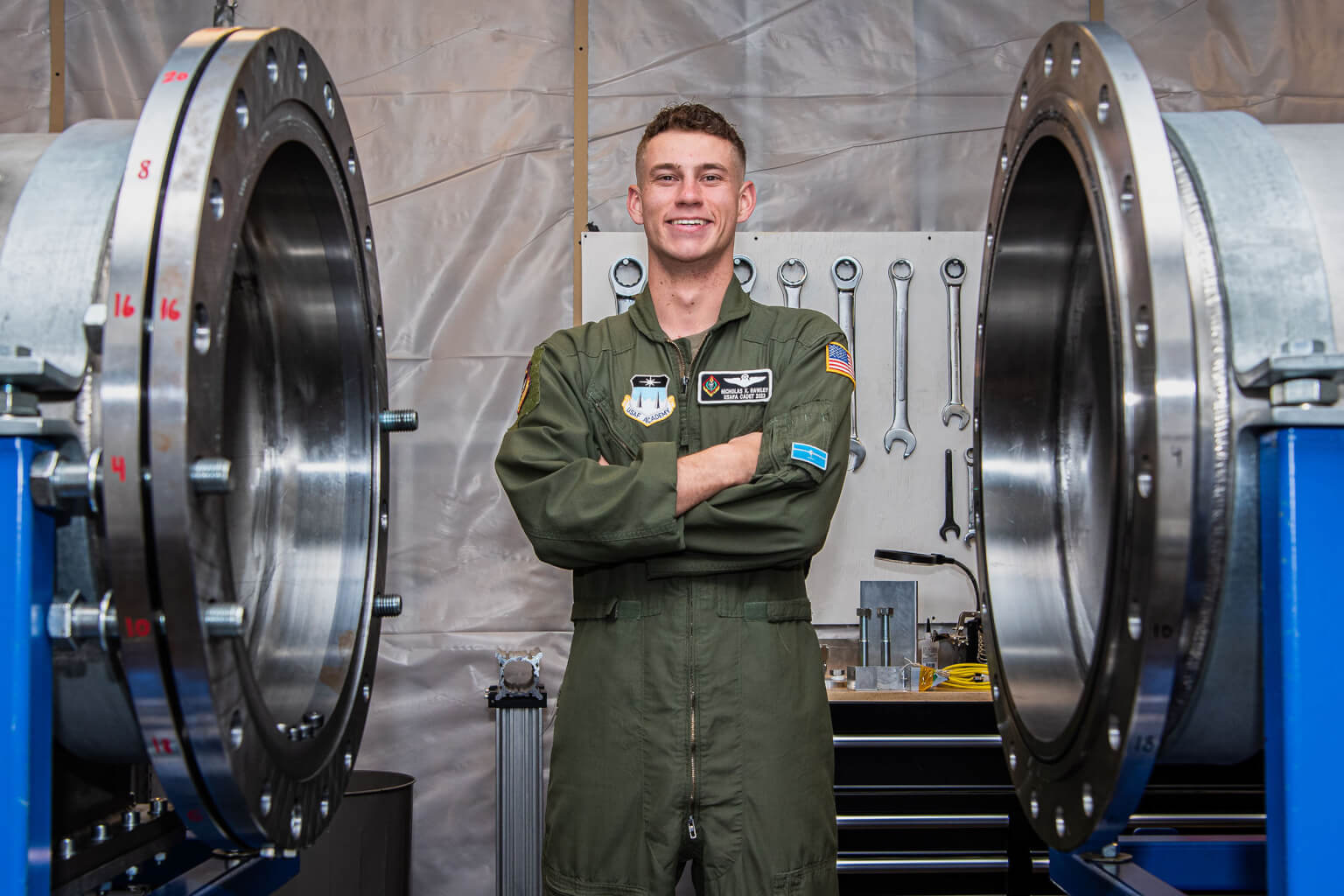 2nd Lt. Nicholas X. Hawley takes a break from hypersonic research in front of the Ludwieg tube.