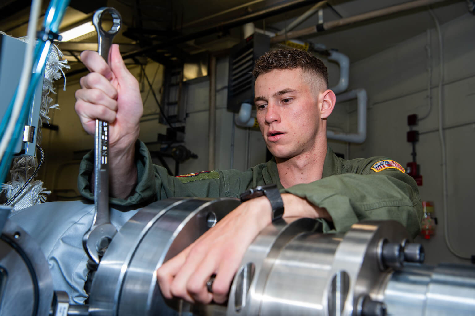 2nd Lt. Nicholas X. Hawley works on the combustion shock tube as he conducts hypersonic research.