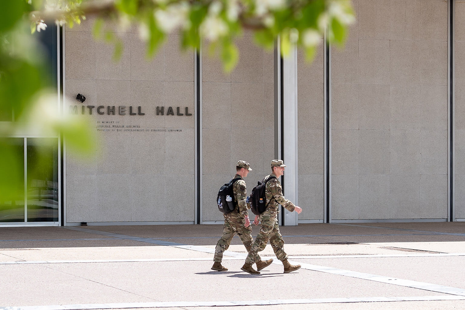 Cadets walking past Mitchell Hall