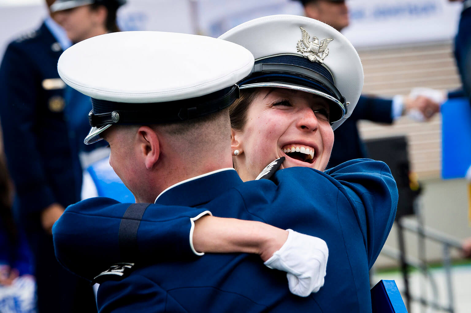 Cadets hugging at graduation