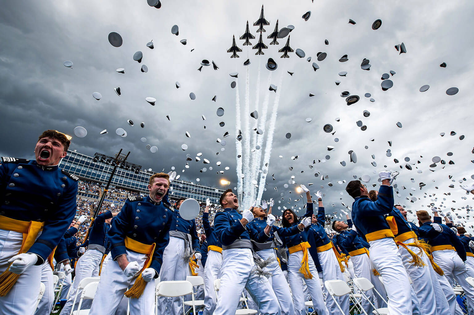 Cadets tossing caps in air