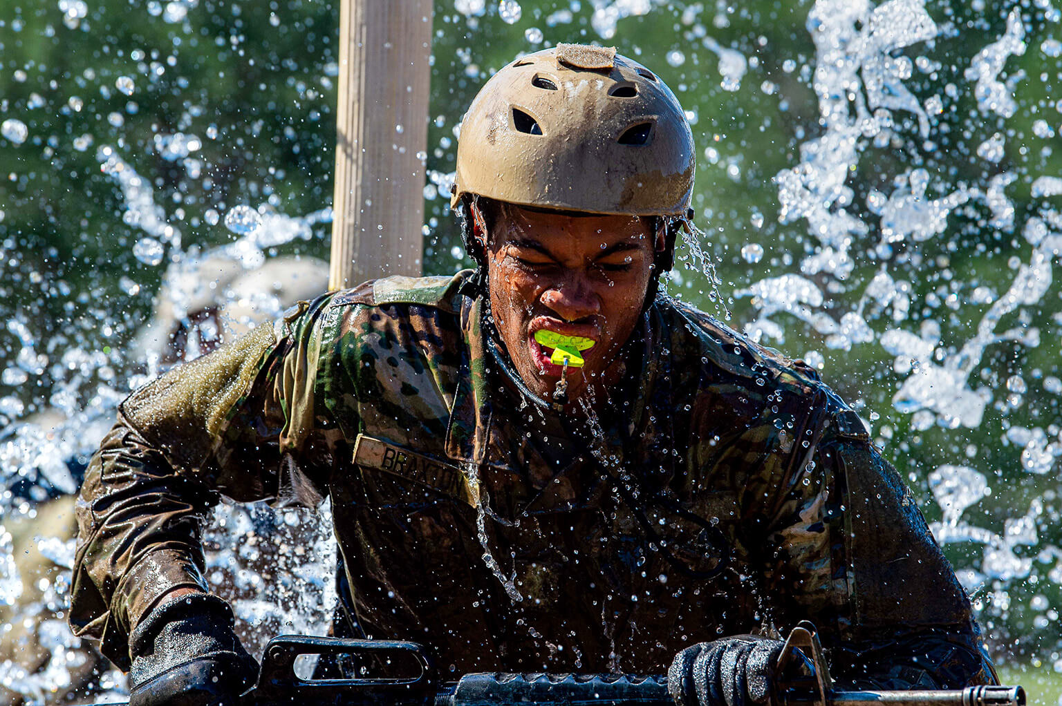 Cadet during Basic Cadet Training holds rifle issued by 10th Logistics Squadron