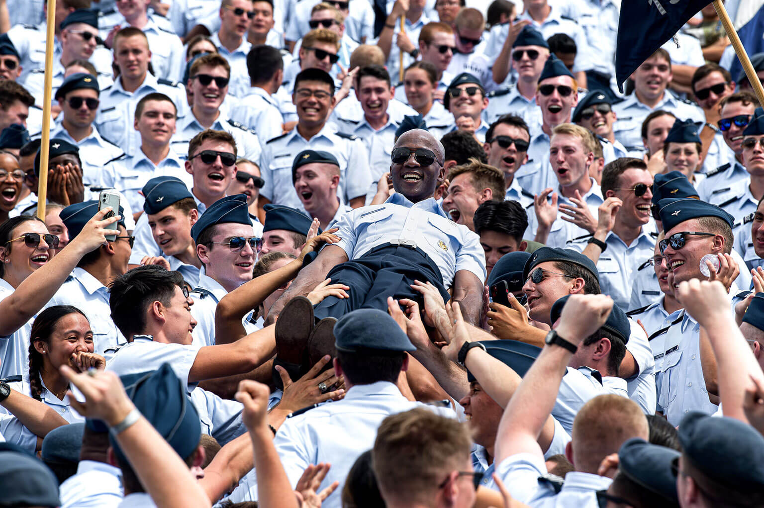Brig. Gen. Gavin Marks experiences the tradition of crowd-surfing