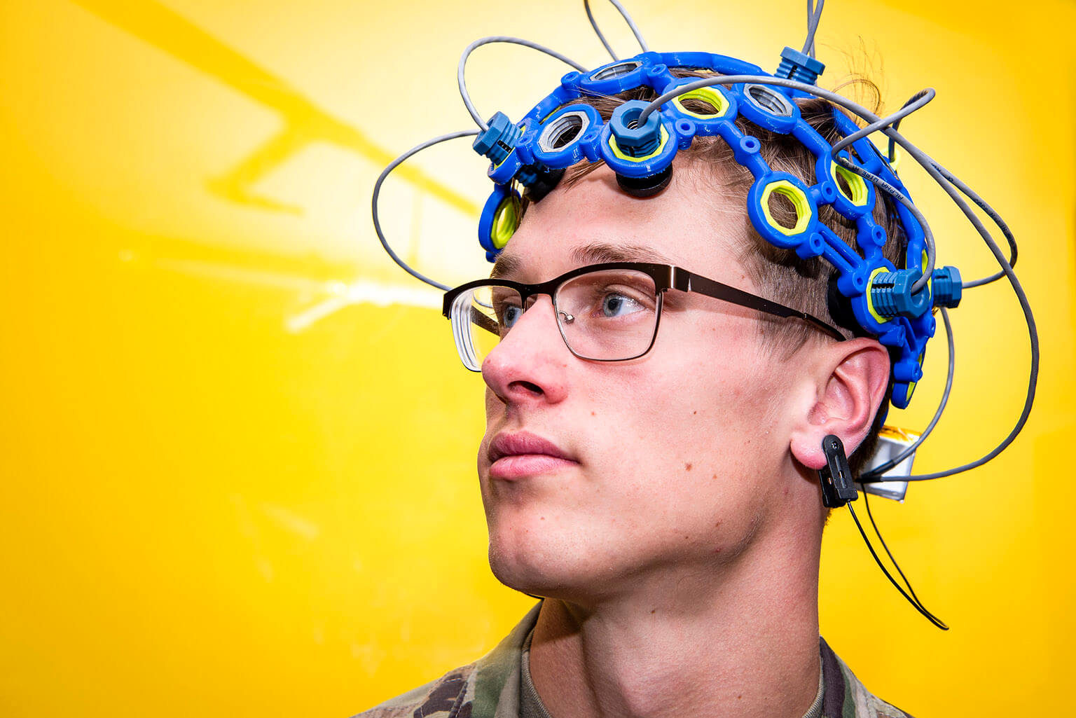 Cadet 1st Class Samuel Brennen demonstrates brain-computer interface technology