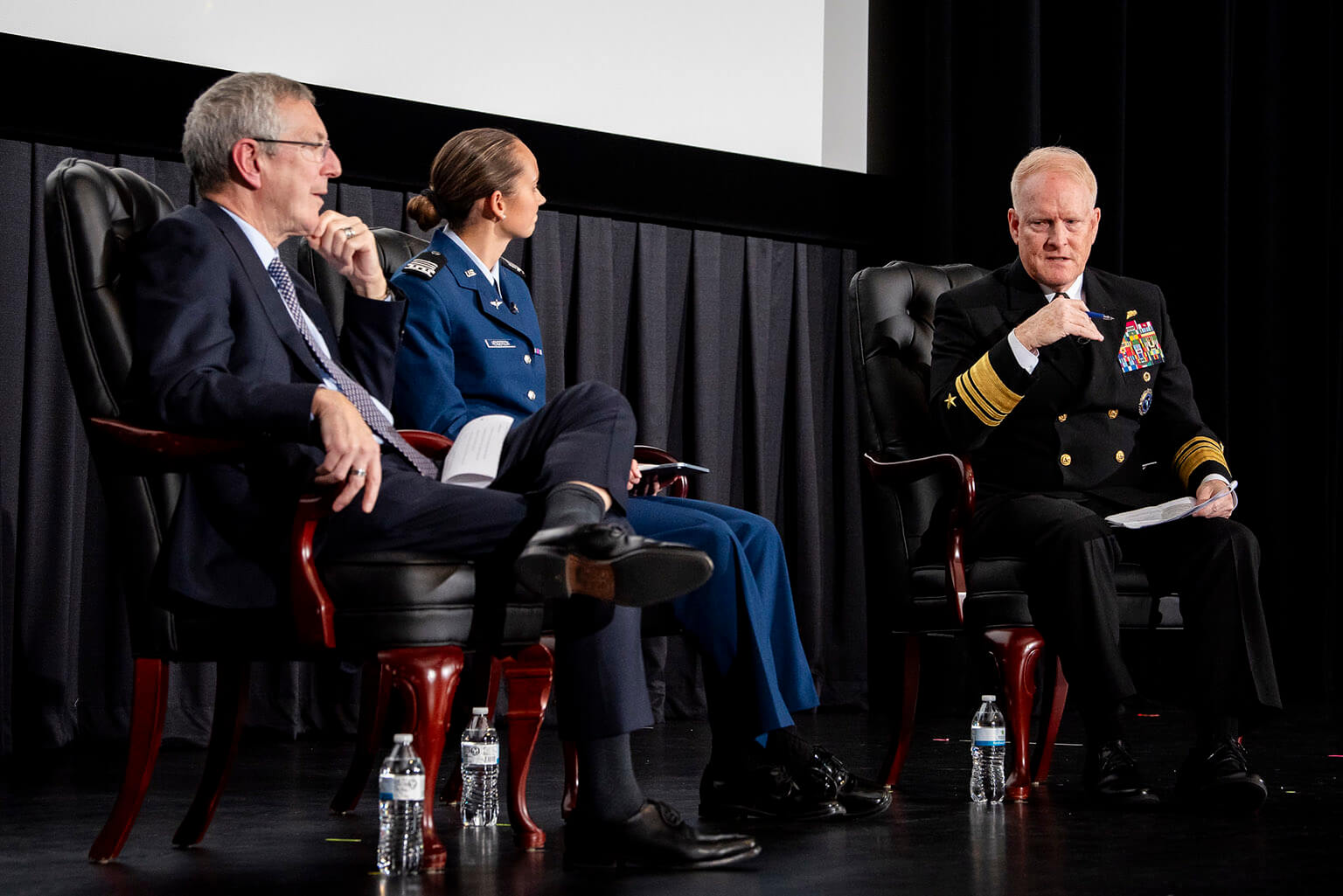 Alan Estevez, U.S. Department of Commerce Industry and Security undersecretary, U.S. Air Force Academy Cadet 1st Class Mary Henderson, and Vice Admiral Frank Whitworth, National Geospatial-Intelligence Agency director