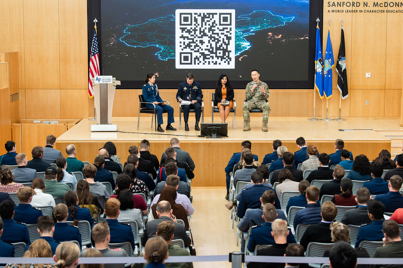 Panelists speak at the 65th Academy Assembly