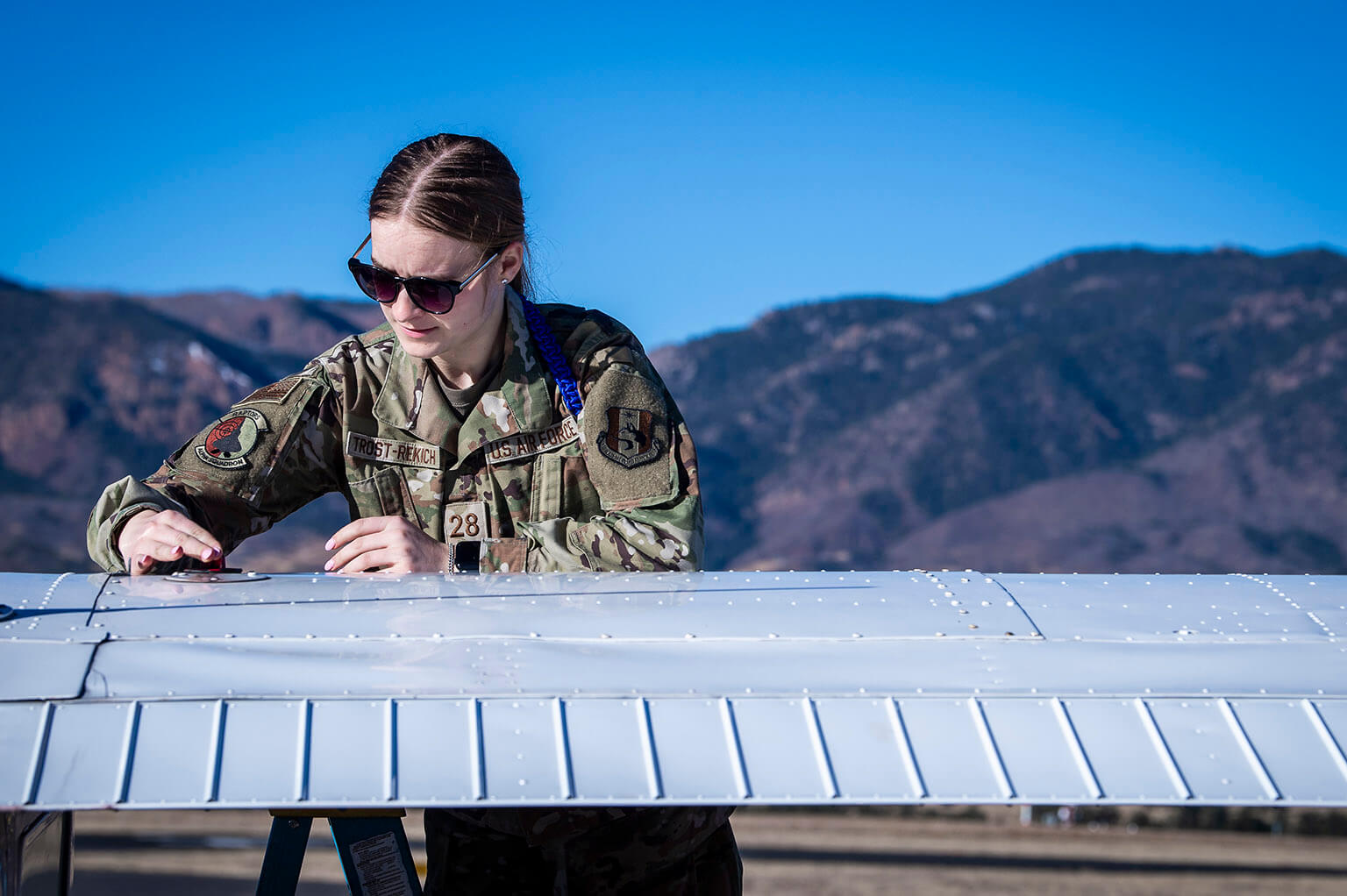Cadet with plane wing