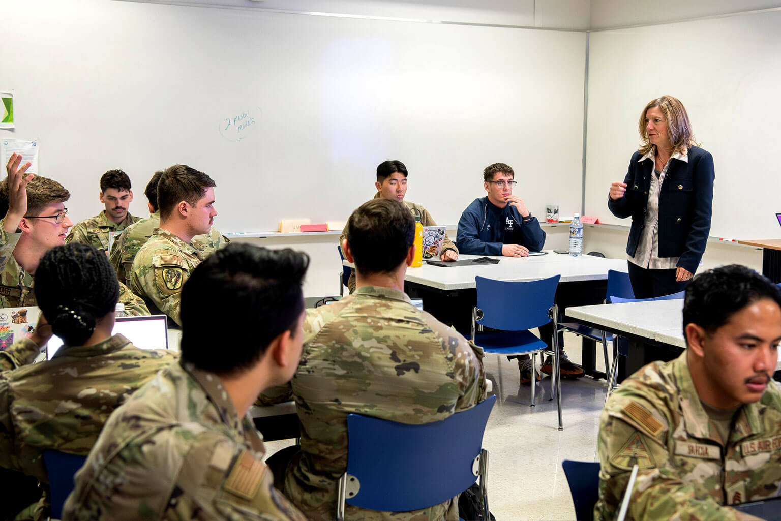 Dr. Amanda Metcalfe, U.S. Air Force Academy Behavioral Sciences and Leadership assistant professor, answers a question during an introductory leadership class at the Academy.