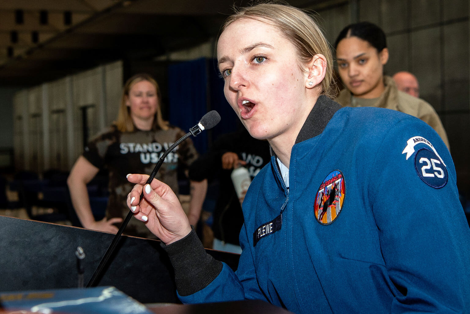 Cadet 2nd Class Hannah Plewe delivers an announcement at the Cadet Wing’s kickoff for Sexual Assault Awareness and Prevention Month in Mitchell Hall.