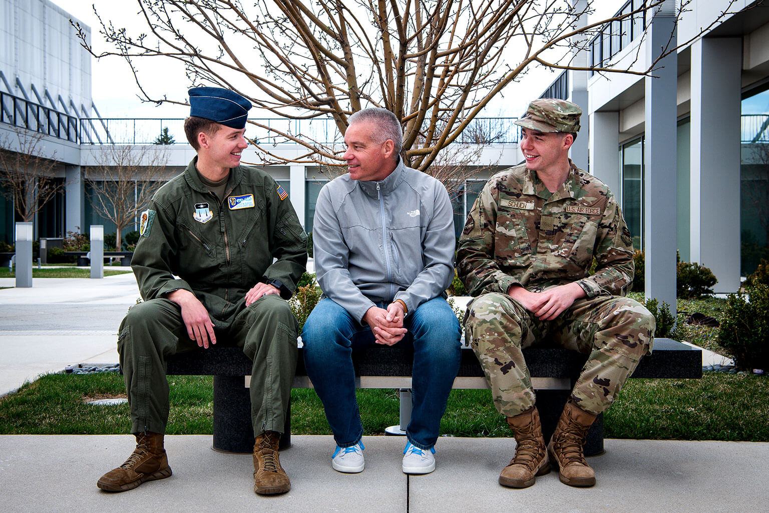 Cadet 2nd Class Chad Schuch Jr. and Cadet 4th Class Dylan Schuch talk to their father, Chad Schuch Sr. outside Polaris Hall.