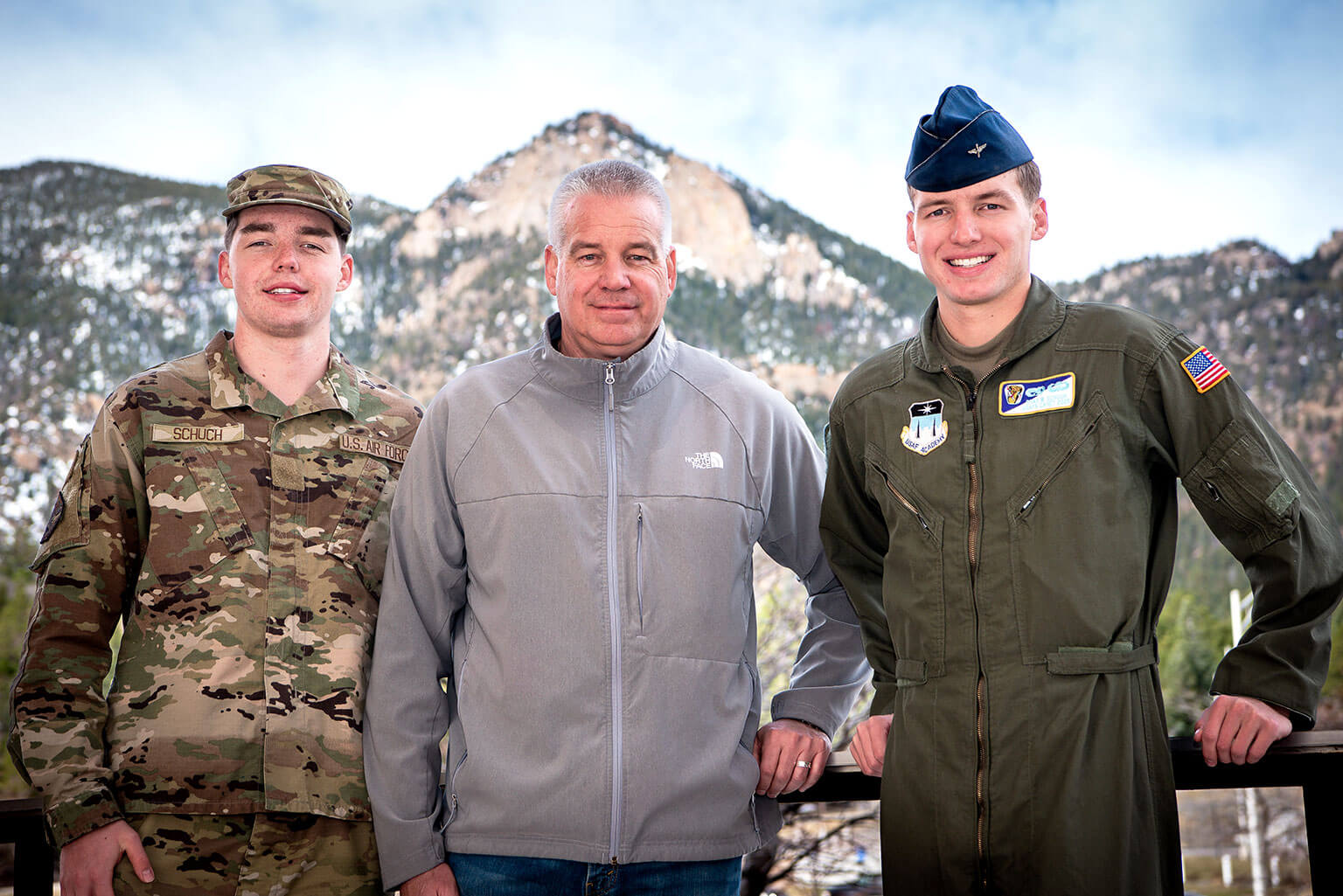 Cadet 4th Class Dylan Schuch and Cadet 2nd Class Chad Schuch Jr. pose with their father.