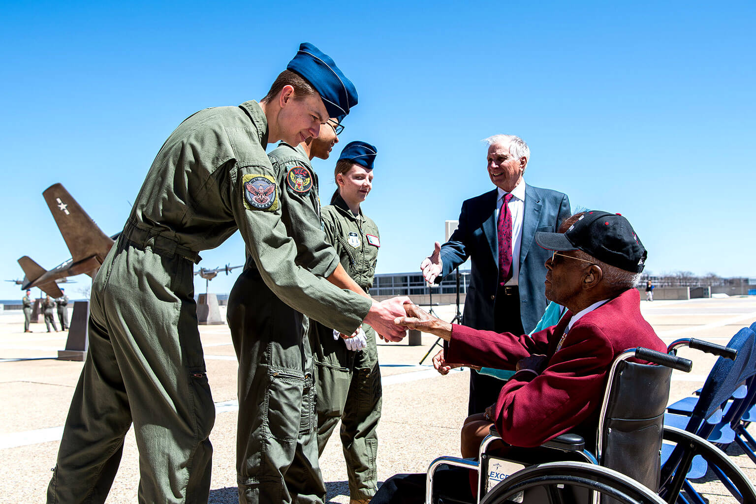 Cadets welcome retired Col. James H. Harvey, the only surviving documented original Tuskegee Airman.