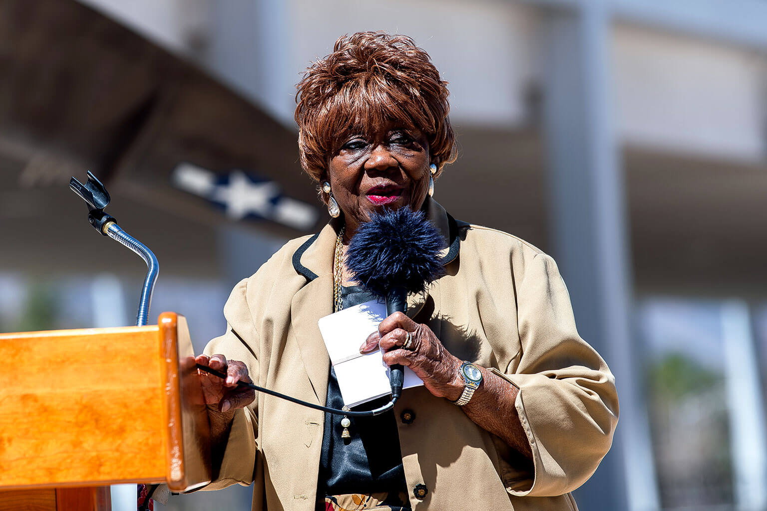 Peggy Shivers speaks at the Tuskegee Airmen statue re-dedication and wreath-laying ceremony.