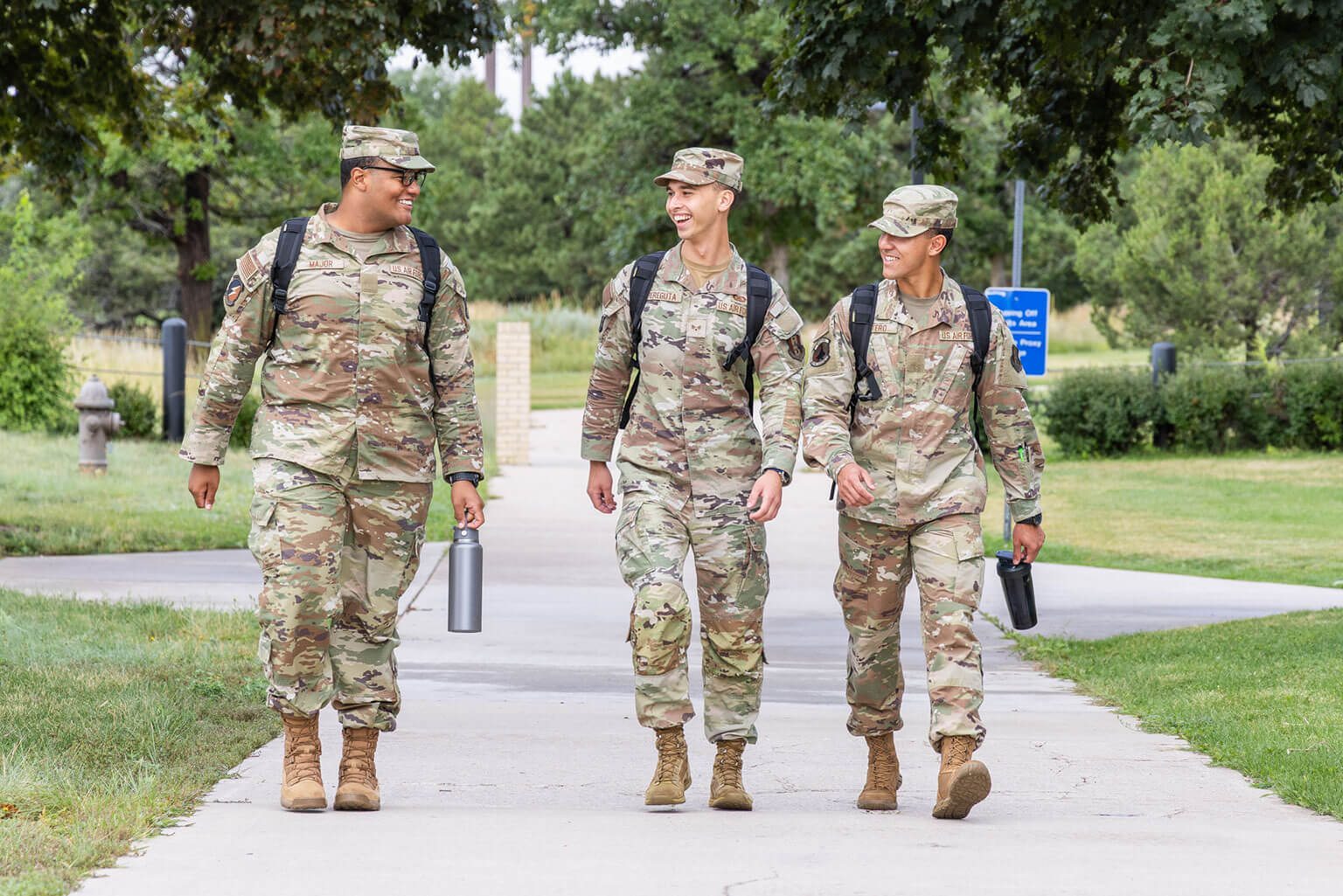 Then-Cadet Candidate Roman Bereguta, center, walks with classmates outside the U.S. Air Force Academy Preparatory School, Colo., Aug. 26, 2025. As a prior-enlisted cadet candidate, Bereguta helped classmates adjust to military standards while working through his own transition back to academic life. (U.S. Air Force photo by Trevor Cokley)