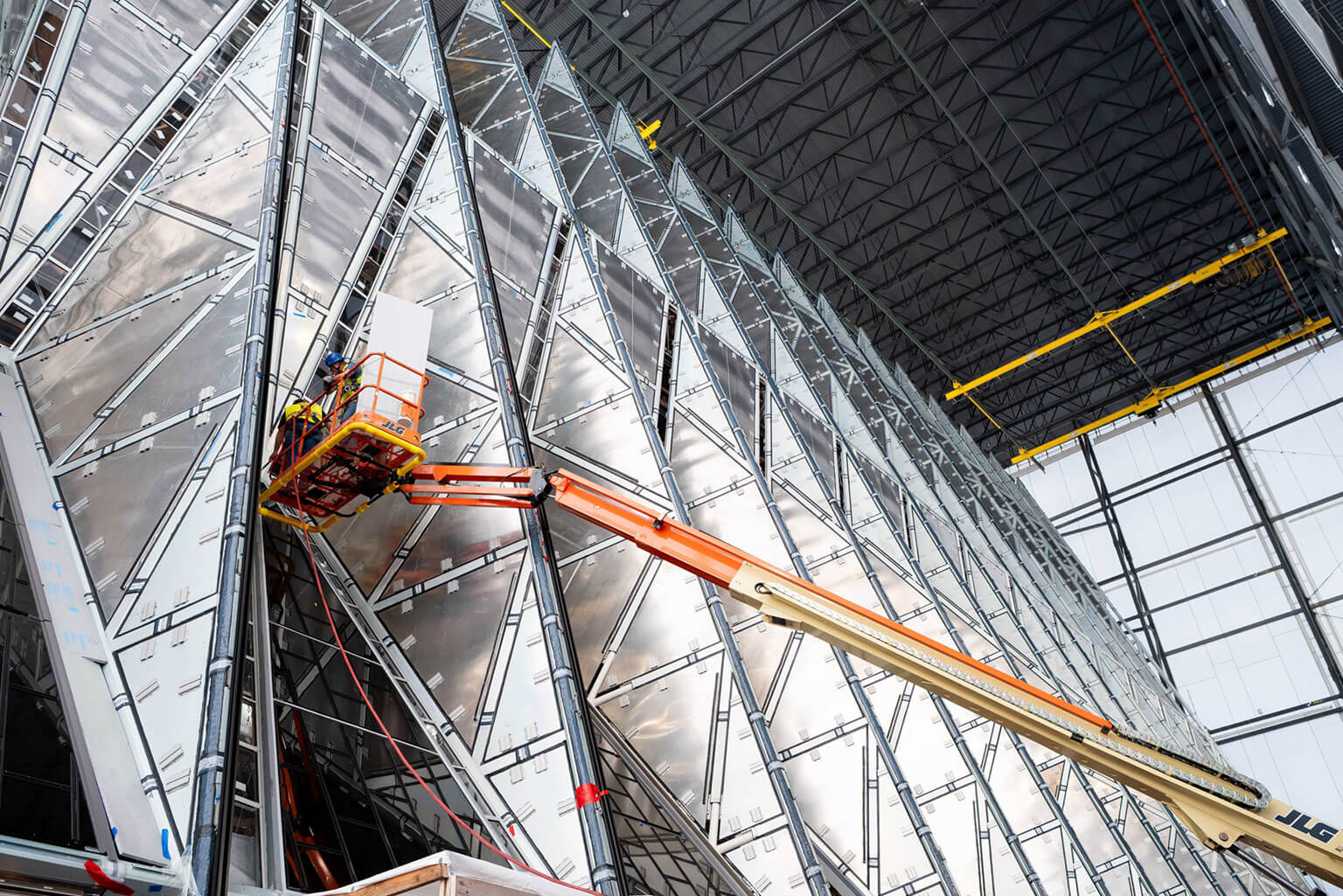 Contractors conduct water-tightness testing on the exterior of the U.S. Air Force Academy Cadet Chapel, Dec. 16, 2025. The test involves spraying the chapel’s new exterior panels with water at 30 to 35 pounds per square inch while crews inside monitor for any signs of penetration. (U.S. Air Force photo by Dylan Smith)