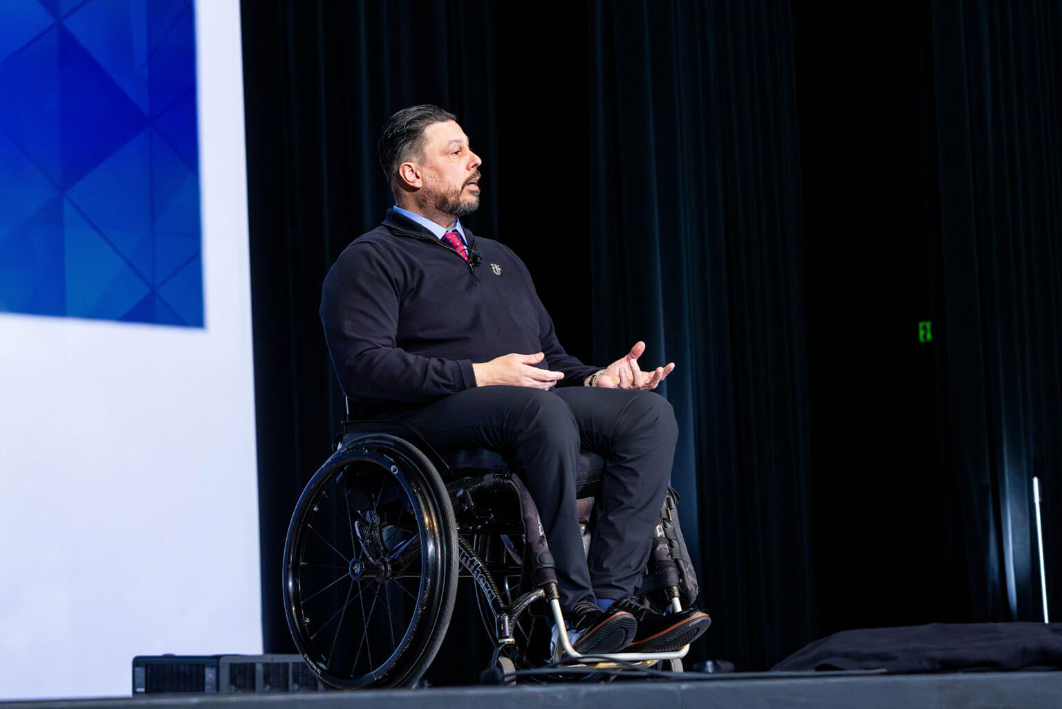 Master Sgt. (Ret.) George Vera delivers a keynote address, “Courage Under Fire: Leading Soldiers in Contact,” during the National Character and Leadership Symposium at Arnold Hall at the U.S. Air Force Academy, Colo., Feb. 21, 2026. Drawing on his combat experience, Vera reinforced the symposium theme, “Courage to Lead in the Profession of Arms: Combat & Crisis-Tested Character,” highlighting the demands of leadership under fire. (U.S. Air Force photo by Trevor Cokley)