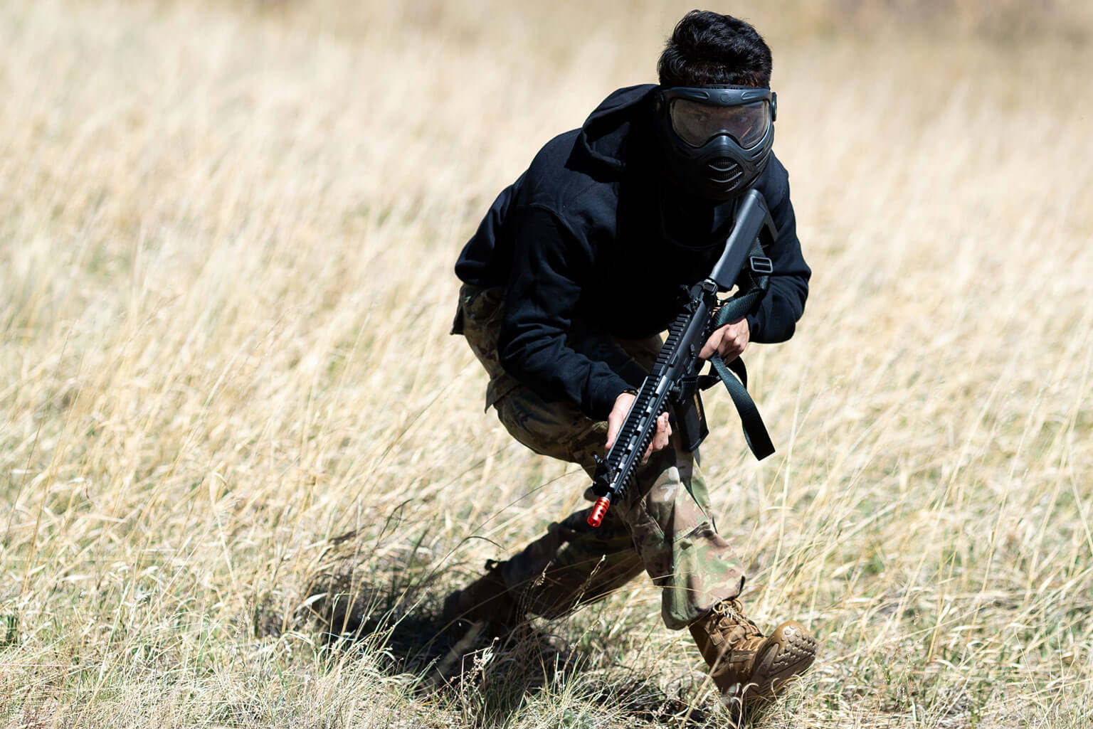 A cadet on the opposing force (OPFOR) attacks a dismounted patrol of cadets during the Spring Culminating Exercise at the U.S. Air Force Academy, Colo., April 16, 2026. During the exercise, a Quick Response Force used small unit tactics and field communication techniques to locate and extract a cadet from enemy territory. (U.S. Air Force photo by Ray Bahner)