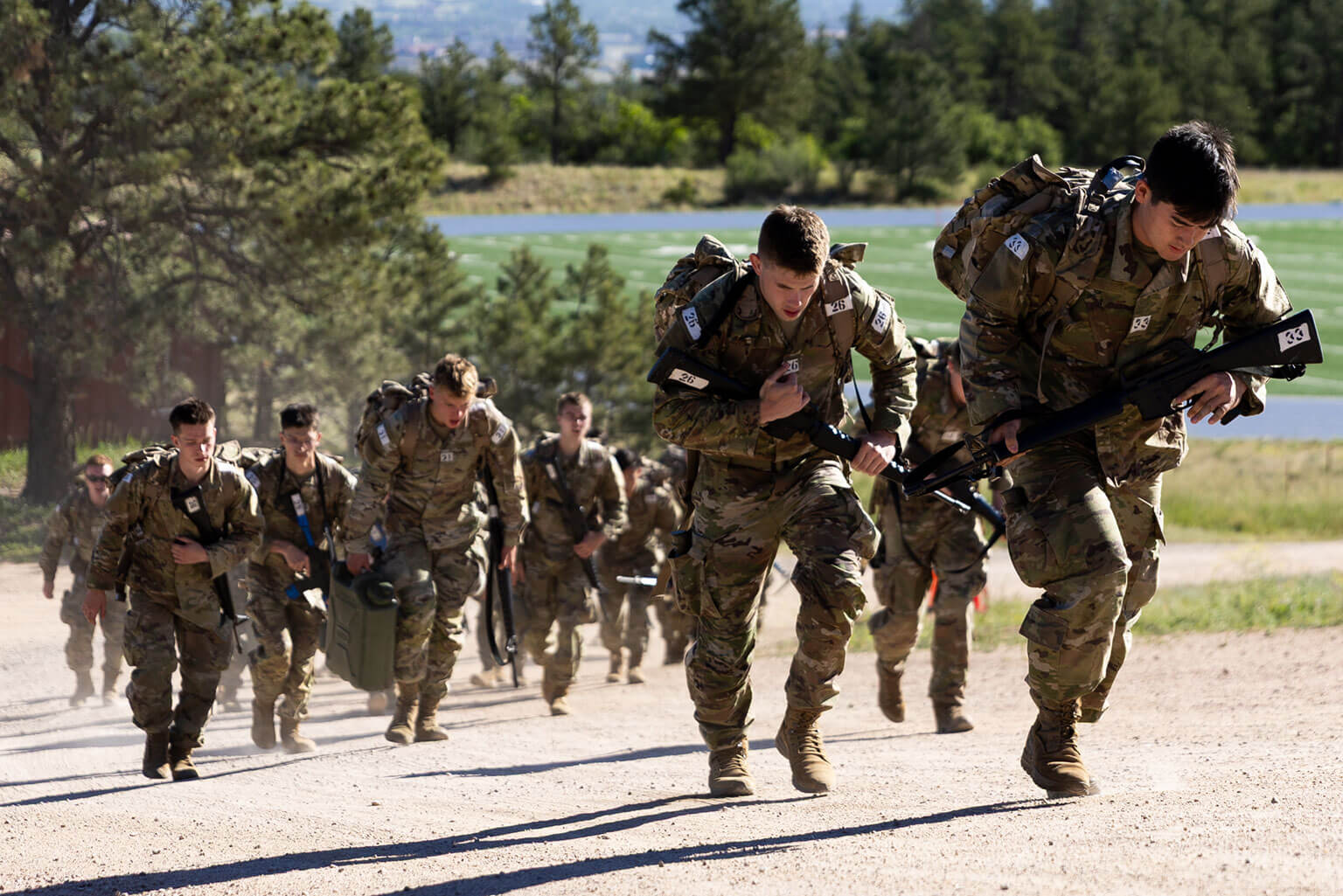 Cadets observe a U.S. Army AH-64 Apache helicopter during a Special Warfare Orientation Course (SWOC) full mission profile at the U.S. Air Force Academy, Colo., June 15, 2026. During SWOC’s second week, Academy and ROTC cadets participated in full mission profiles to gain insight into the preparation and execution of missions within Air Force Special Warfare career fields. (U.S. Air Force photo by Jonathan Suni)