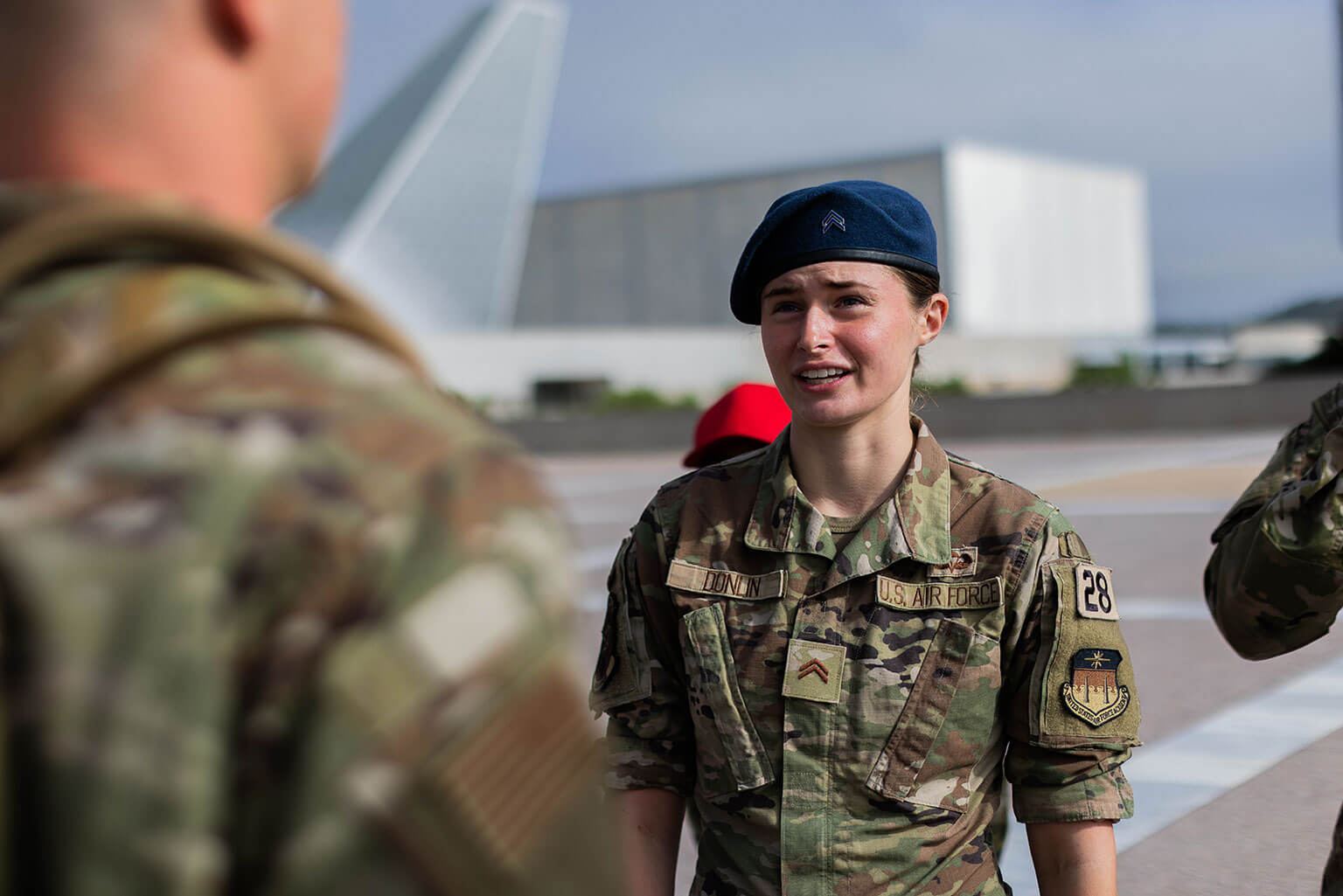 Cadet 3rd Class Ella Donlin, Cadet Cadre, provides feedback to a basic cadet during Basic Cadet Training at the U.S. Air Force Academy, Colo., June 26, 2026. The Basic Cadet Training program introduces basic cadets to military customs and courtesies, discipline, physical fitness and teamwork before they join the Cadet Wing for the academic year. (U.S. Air Force photo by Trevor Cokley)