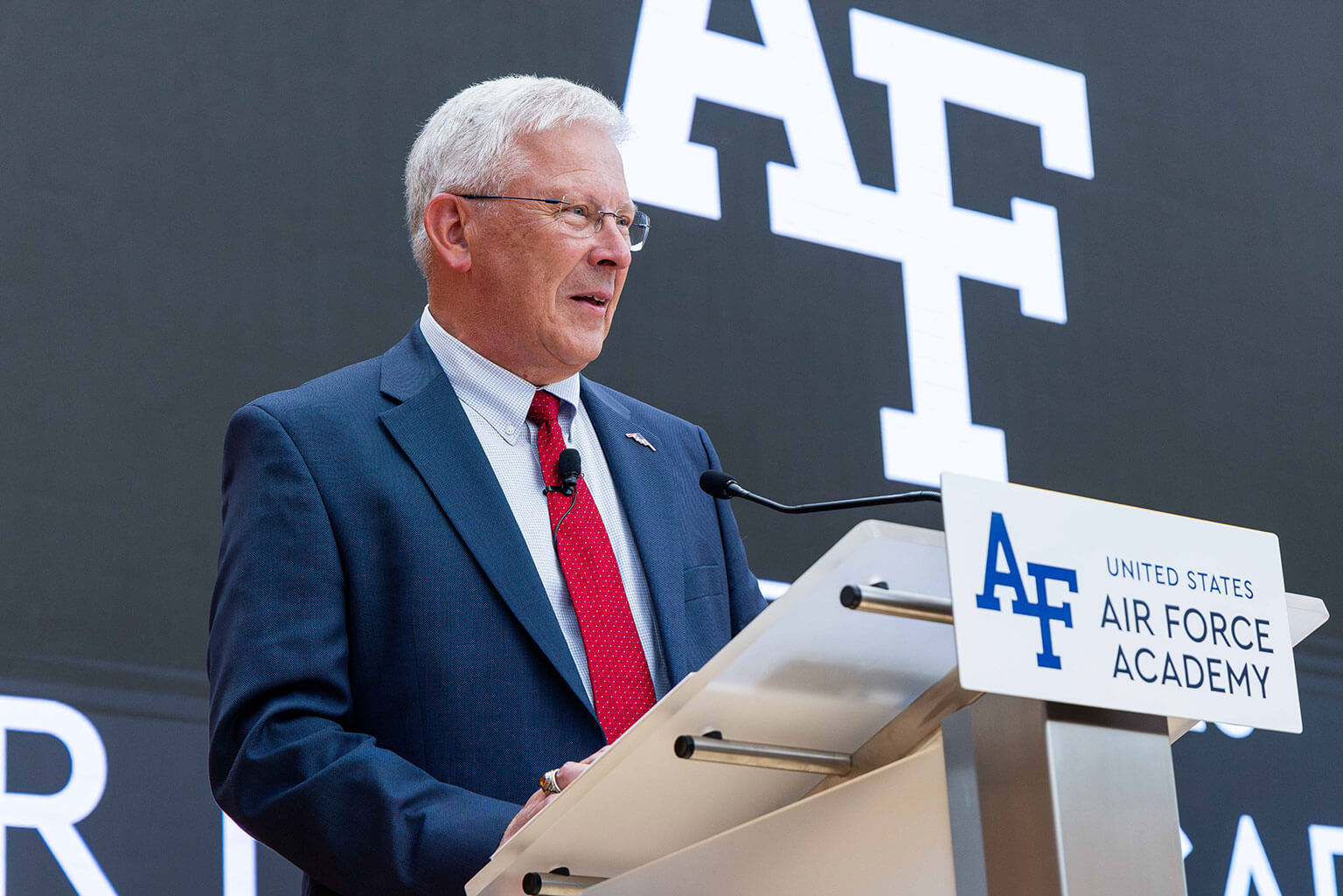 Retired Lt. Gen. Christopher Miller, Class of 1980 and Chief Executive Officer of the Academy Research and Development Institute, delivers the keynote address during a ceremony to honor retired Lt. Gen. Ervin J. Rokke at the U.S. Air Force Academy, Colo., July 24, 2026. Rokke, Class of 1962, was the first Academy graduate to serve as Dean of the Faculty from 1983-86. Academy officials named “Rokke Drive” to honor his decades of service to the Academy, U.S. Air Force and the nation. (U.S. Air Force photo by Trevor Cokley)
