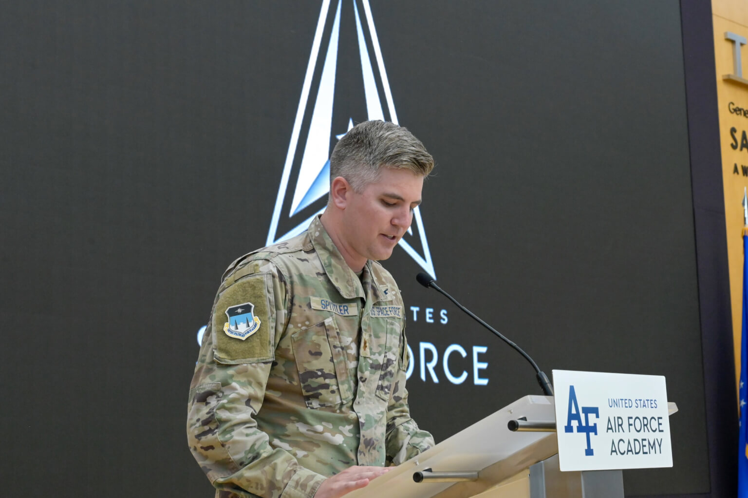 U.S. Space Force Maj Peter Spittler addresses U.S. Air Force Academy Guardian selects during the inaugural Blue Tape Ceremony at Polaris Hall at the Academy, Colo., Aug. 17, 2026. Spittler is one of the active-duty Guardian mentors paired with Guardian selects to provide insight into the operational Space Force and help prepare them for the transition from cadet to Guardian. (U.S. Air Force photo by SSgt Michael Ward)