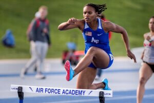 Cadet running hurdles