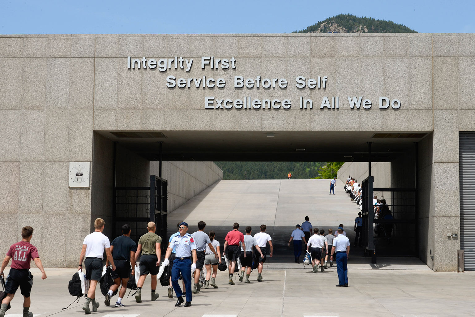 Basic Cadets from the Class of 2023 walk up the Core Values Ramp toward the Cadet Area during In-processing Day at the U.S. Air Force Academy, June 27, 2019. The appointees will complete six weeks of Basic Cadet Training before joining the Cadet Wing. (U.S. Air Force photo by Darcie L. Ibidapo)