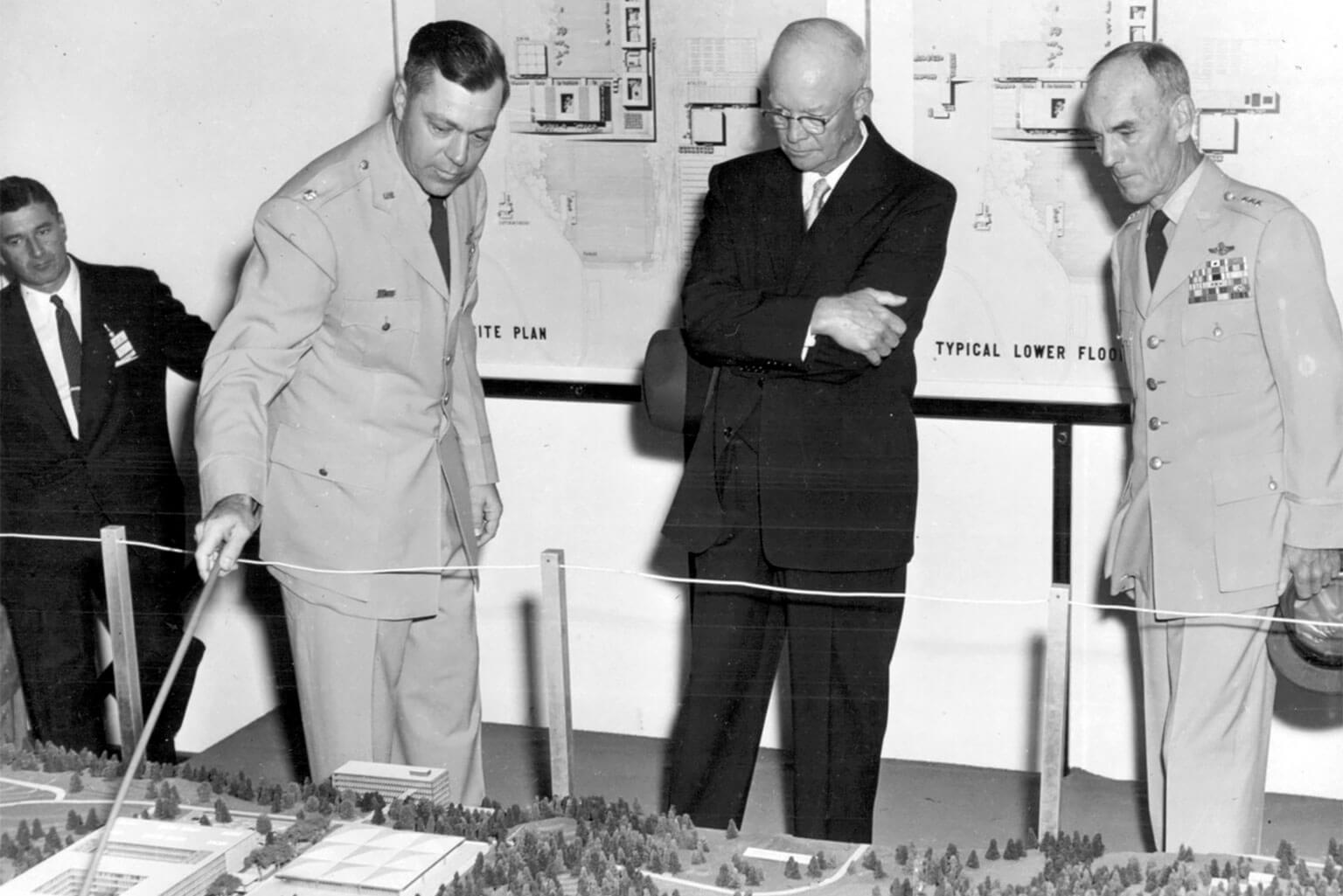 President Dwight D. Eisenhower reviews building plans for the U.S. Air Force Academy in 1955.