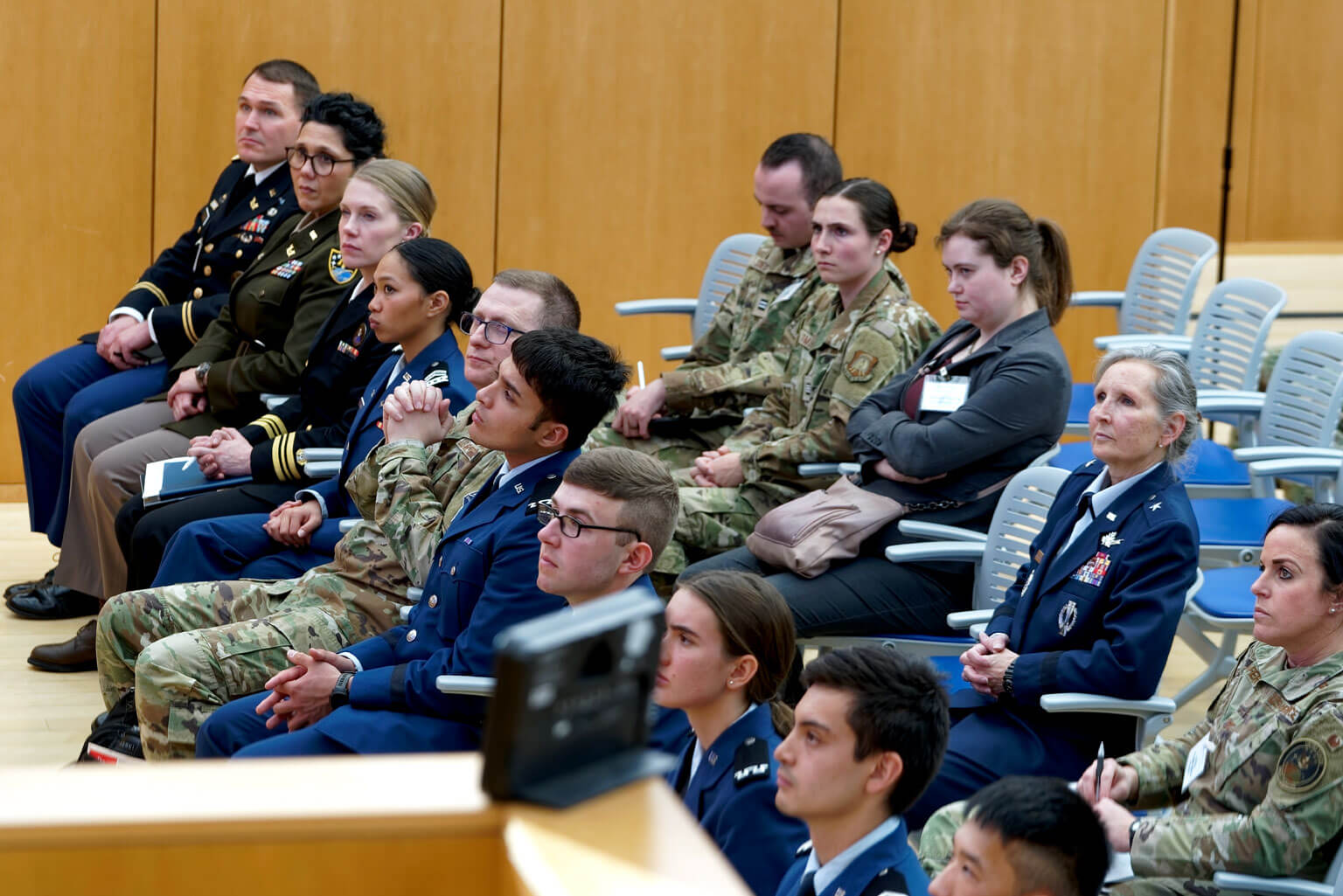 Conference attendees listen to a keynote address during the fourth annual USSPACECOM legal conference.